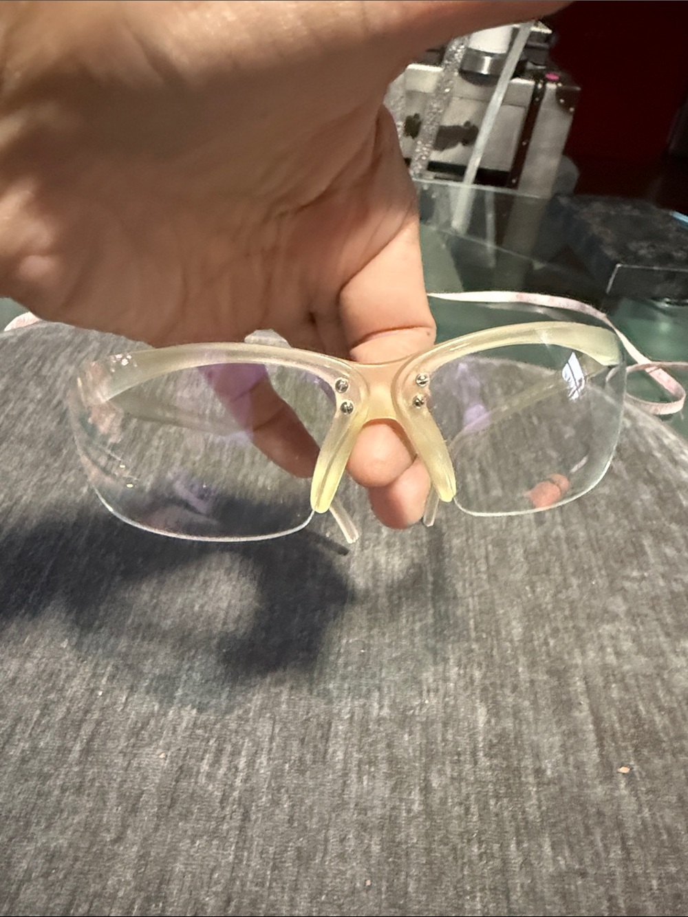 Dolce & Gabbana Translucent Yellow Rimless Sunglasses with Purple Tint